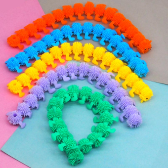 картинка Антистресс браслет 2080-2 (60) Лохматая гусеница 1х25х1см .резина яркий от магазина МОЛТИ