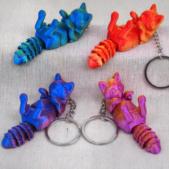 картинка Брелок 8-26 (12) 3D костяной Кот 7х2х2,5см  пластик  от магазина МОЛТИ