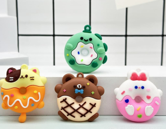 картинка Брелок LGL487 Пончик сладкий 4х1х3см. резиновый от магазина МОЛТИ