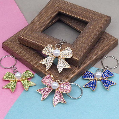 Брелок 270-12 (12) Бантик со стразами металл 4,5х0,3х4см 