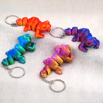 картинка Брелок 8-20 3D костяная Ящерица пластик 9х3х4см от магазина МОЛТИ