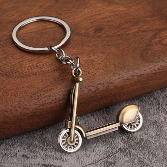 картинка Брелок 8-2 Самокат металл 3,5х4,50,7см от магазина МОЛТИ