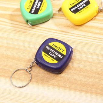 картинка Брелок №1059 Рулетка 1М 3,5х1х3,5см. пластик от магазина МОЛТИ