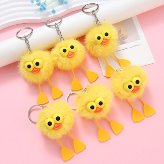 картинка Брелоки 1236-9 (10) пушистик цыпленок с лапками 7,5х4х4,5см от магазина МОЛТИ
