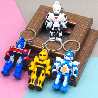 картинка Брелок 728-4-РТ Робот-Трансформер 6х2х4см. резиновый от магазина МОЛТИ