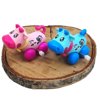 картинка Игрушка заводная АК2-20/695 (12) коровка пластик 7х9,5х6см от магазина МОЛТИ