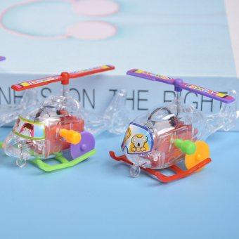 картинка Игрушка 1412-В7 заводной вертолет в и/у 7,5*4 см. от магазина МОЛТИ