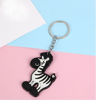 картинка Брелок 1688-3_2 Зебра резиновая плоская 6х0,3х4,5см. от магазина МОЛТИ